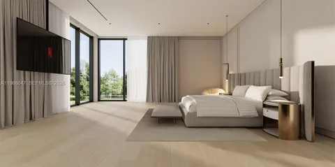 a bedroom with a bed lamps and a fireplace