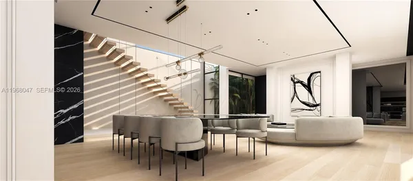 a balcony with table and chairs