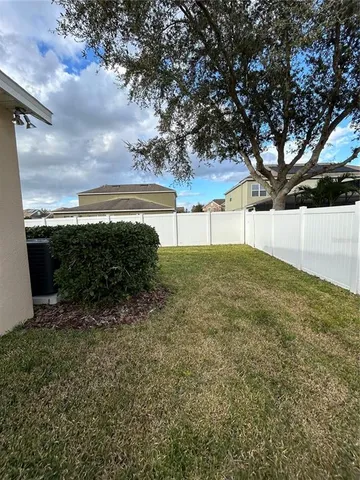 a view of back yard of the house