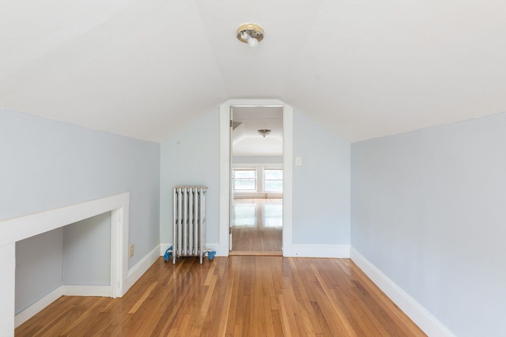 112 Brush Hill Road Milton, MA 02186 - Photo 39 of 42 a view of wooden floor in a room