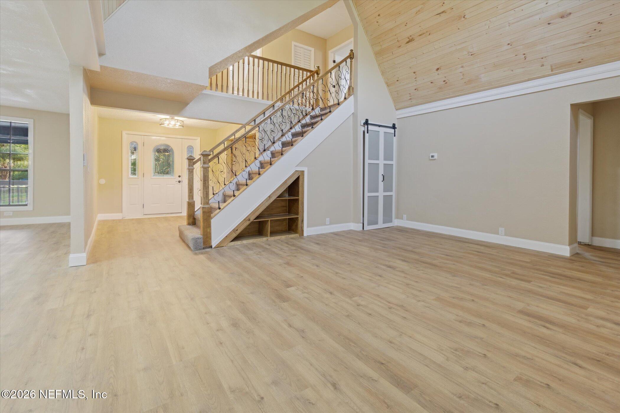 3121 Lannie Road Jacksonville, FL 32218 - Photo 15 of 68 a view of entryway and hall with wooden floor