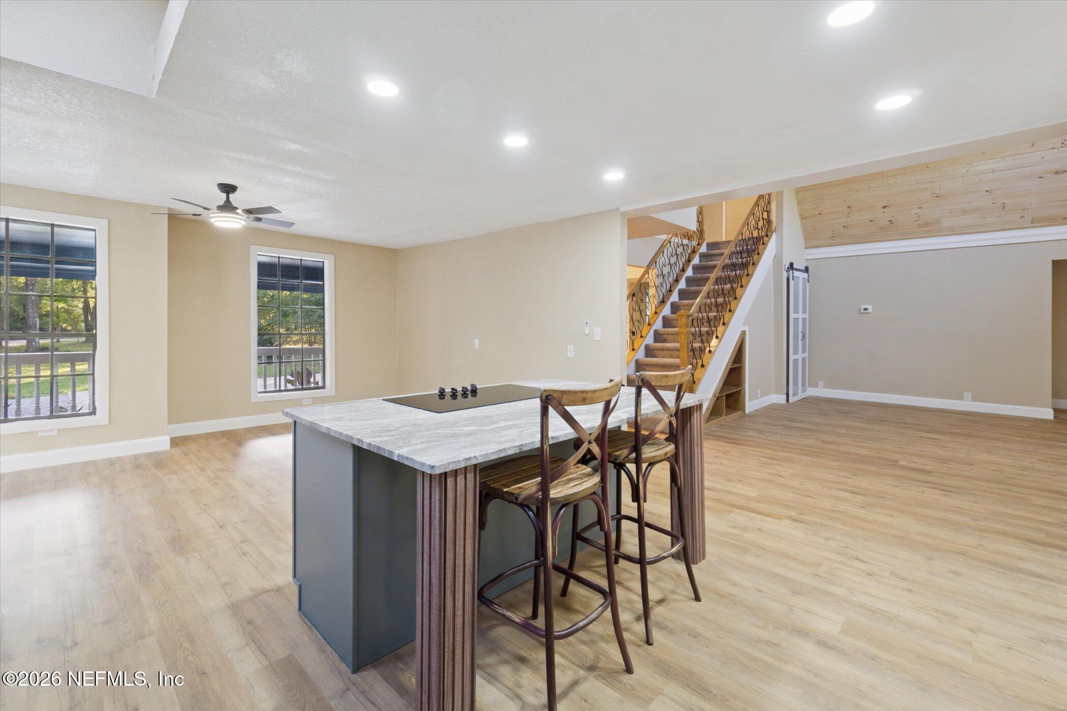 3121 Lannie Road Jacksonville, FL 32218 - Photo 20 of 68 a view of a room with furniture and wooden floor