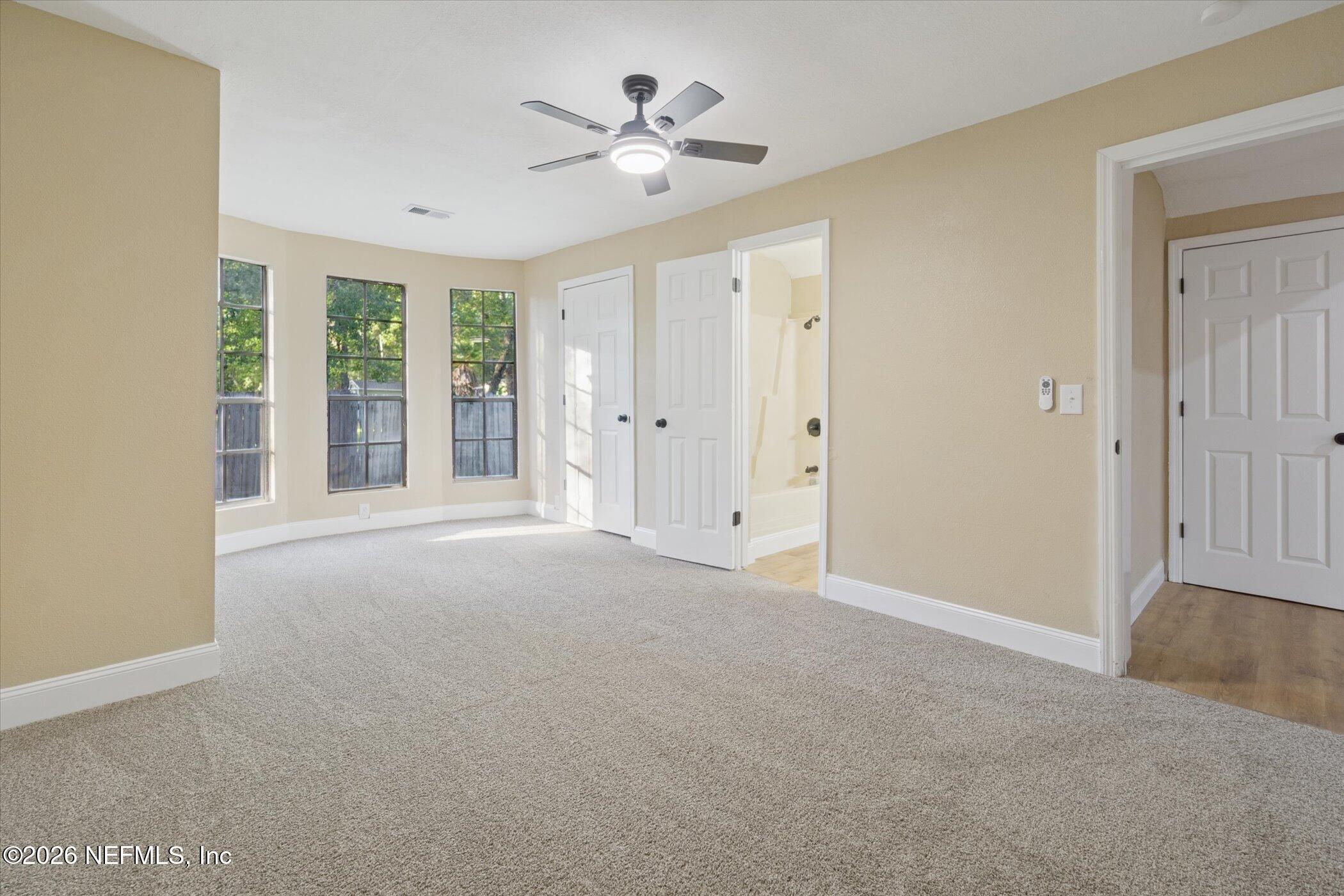 3121 Lannie Road Jacksonville, FL 32218 - Photo 34 of 68 a view of an empty room with a window