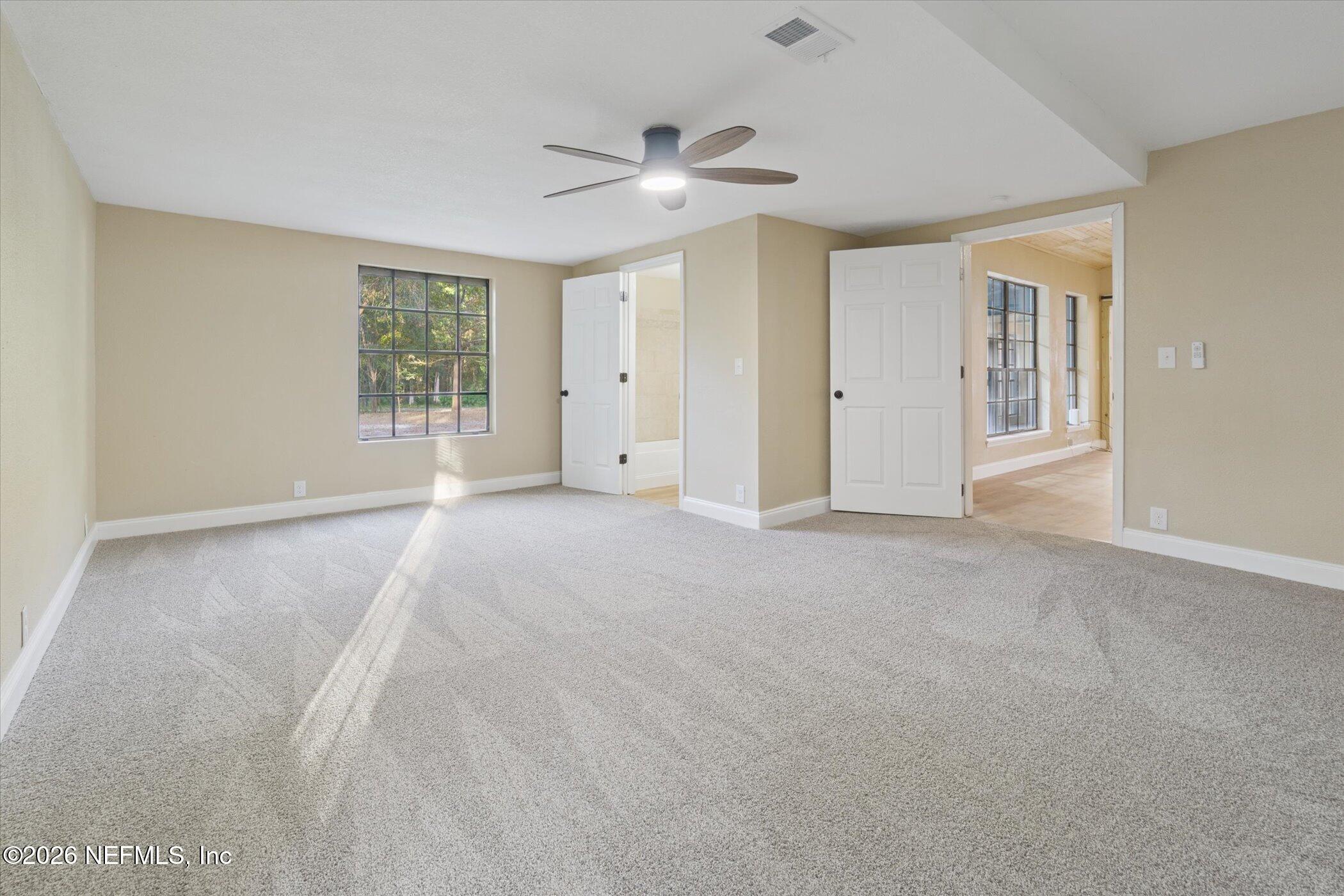 3121 Lannie Road Jacksonville, FL 32218 - Photo 38 of 68 a view of an empty room with a window