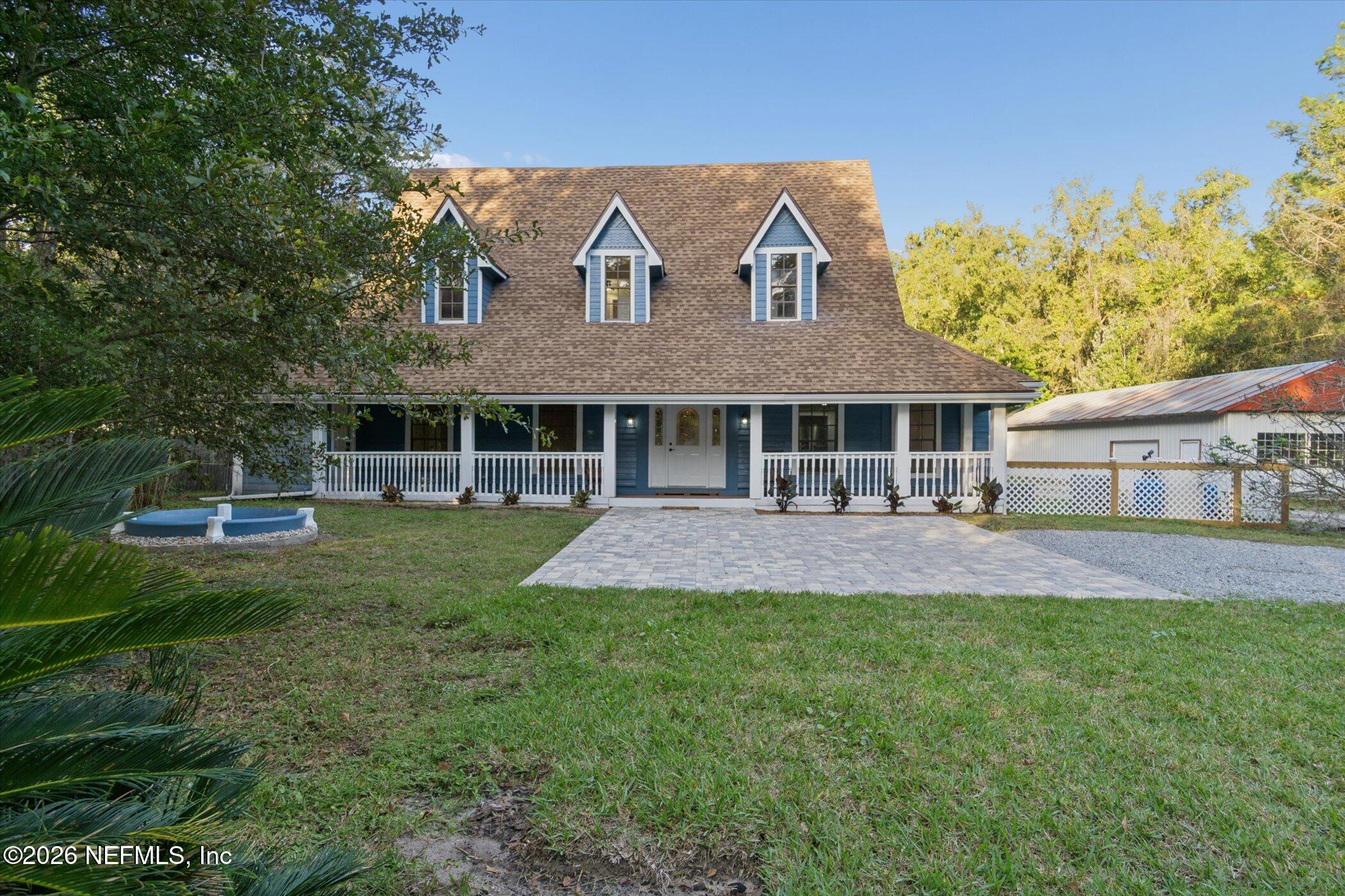 3121 Lannie Road Jacksonville, FL 32218 - Photo 4 of 68 a view of a yard in front of a house