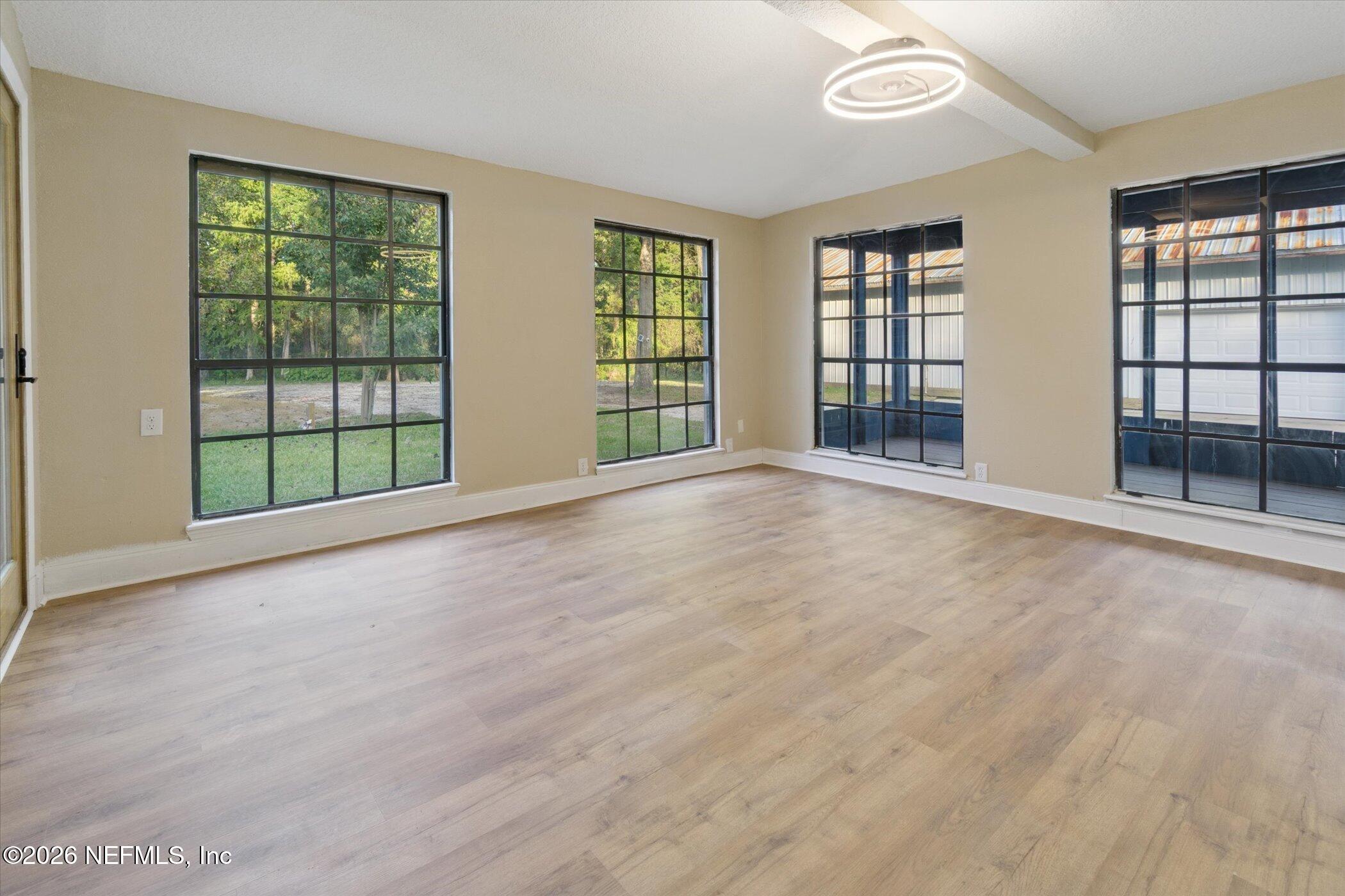 3121 Lannie Road Jacksonville, FL 32218 - Photo 46 of 68 a view of an empty room with a window