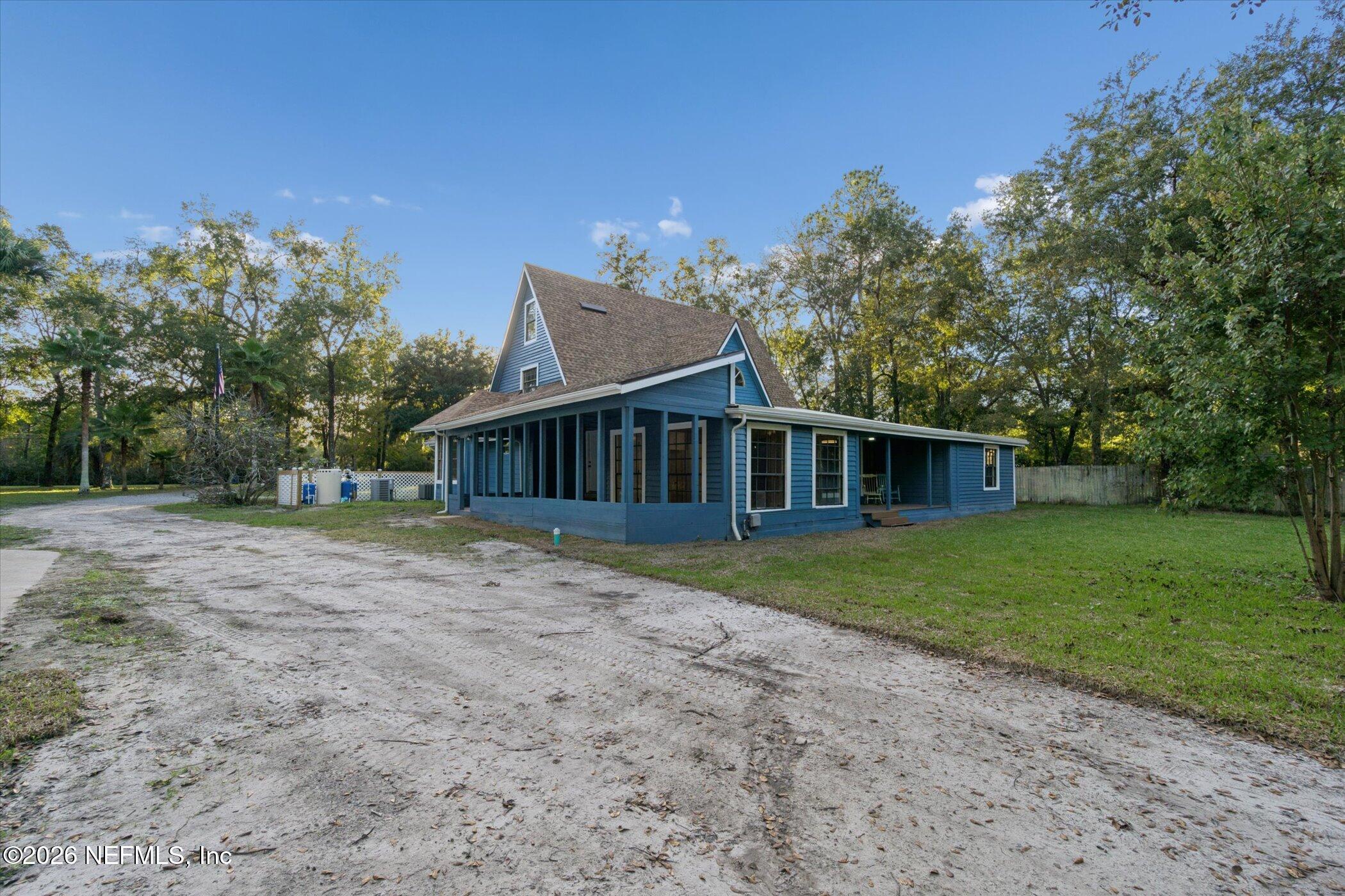 3121 Lannie Road Jacksonville, FL 32218 - Photo 52 of 68 a view of a house with a yard