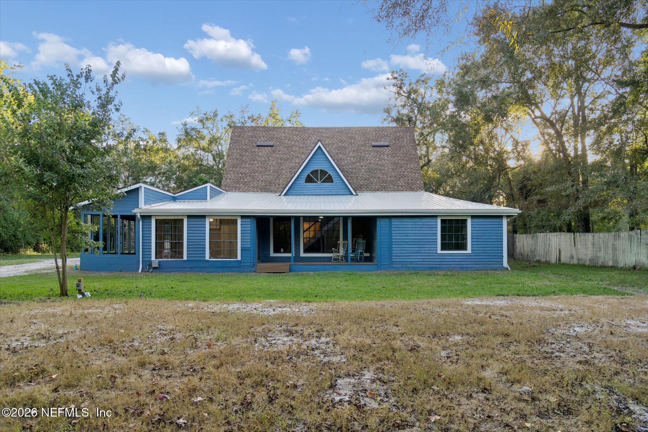 3121 Lannie Road Jacksonville, FL 32218 - Photo 53 of 68 a front view of a house with a yard