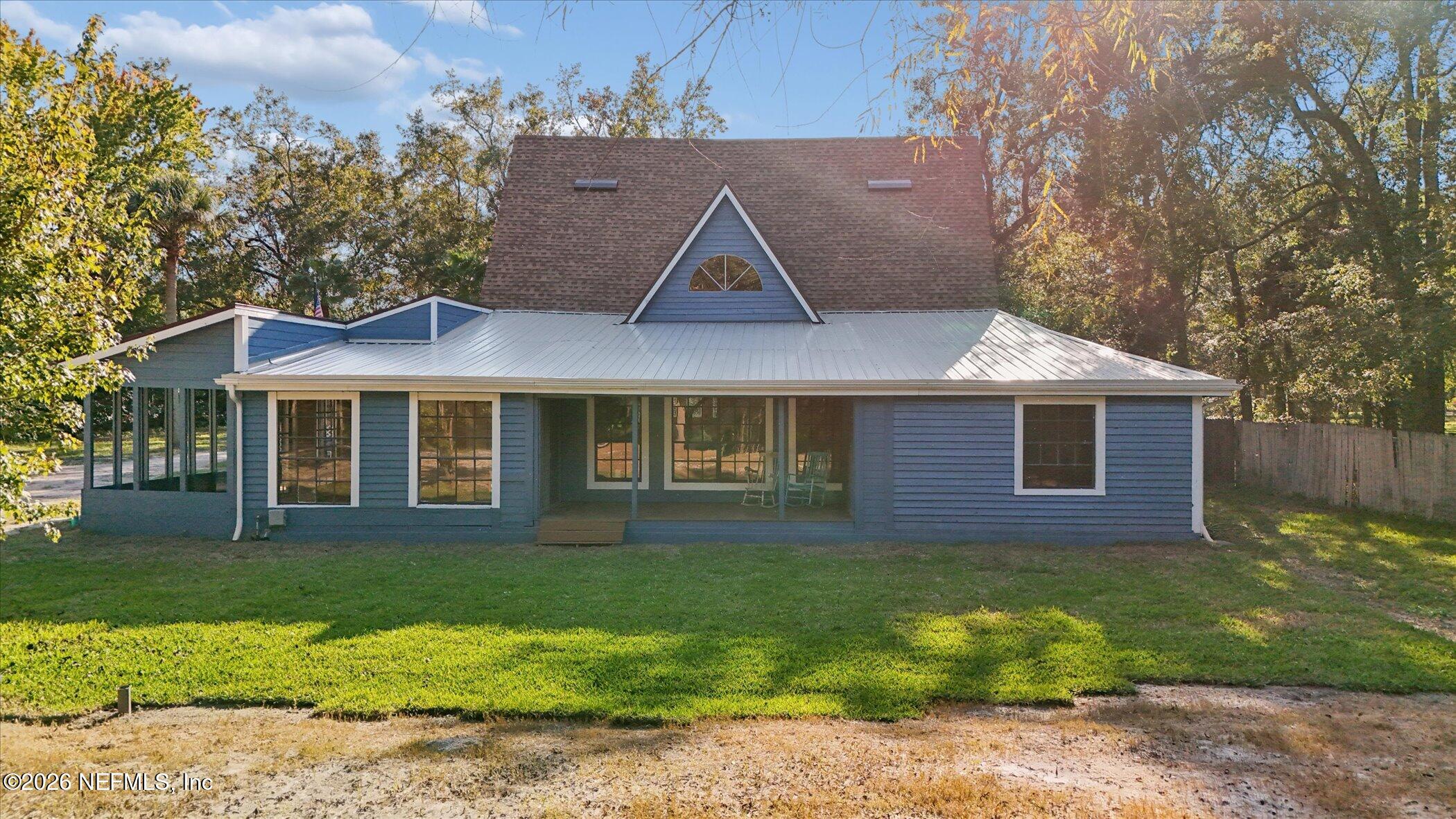 3121 Lannie Road Jacksonville, FL 32218 - Photo 59 of 68 a view of a yard in front of a house