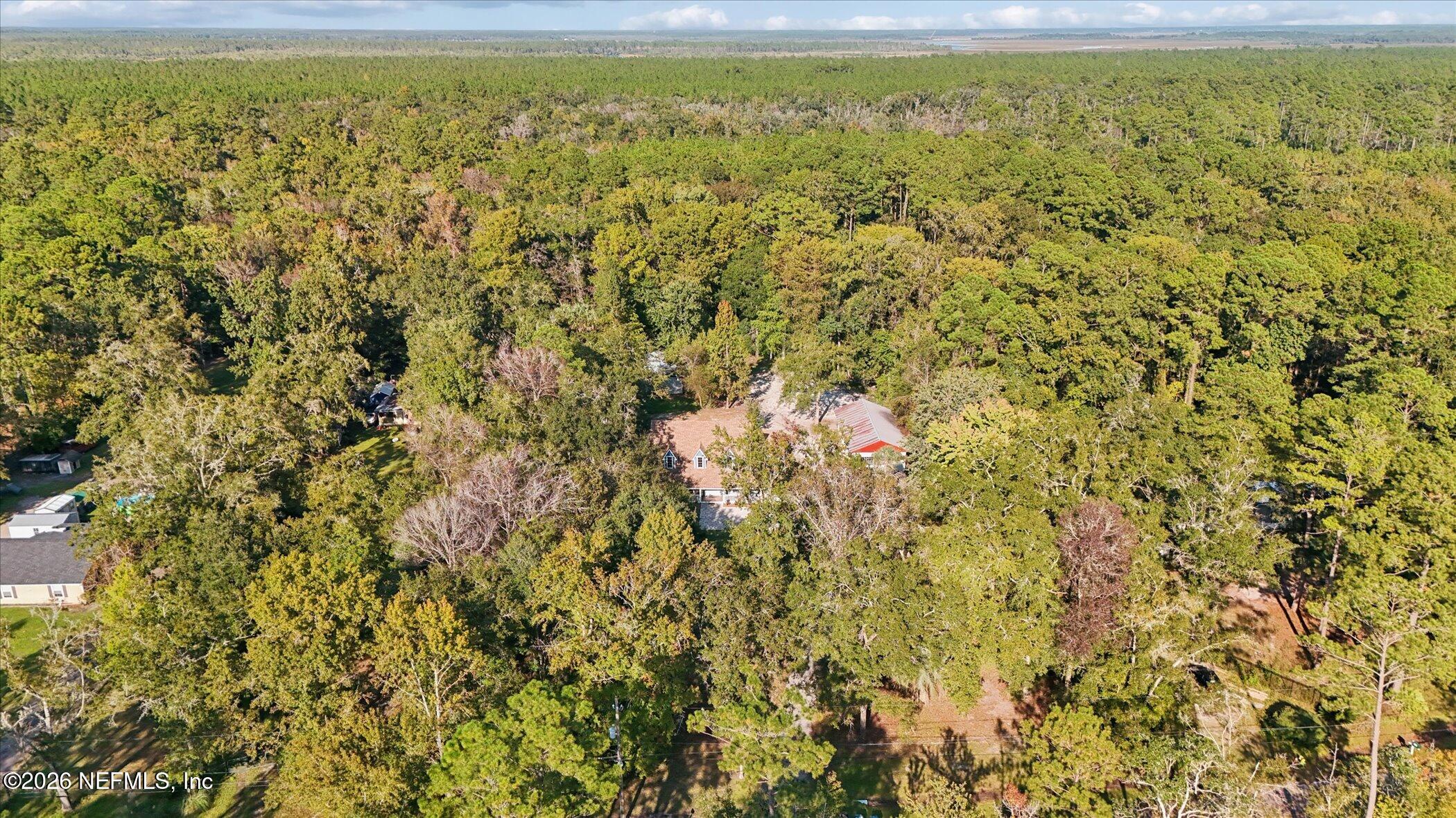 3121 Lannie Road Jacksonville, FL 32218 - Photo 63 of 68 a view of a yard with an outdoor space