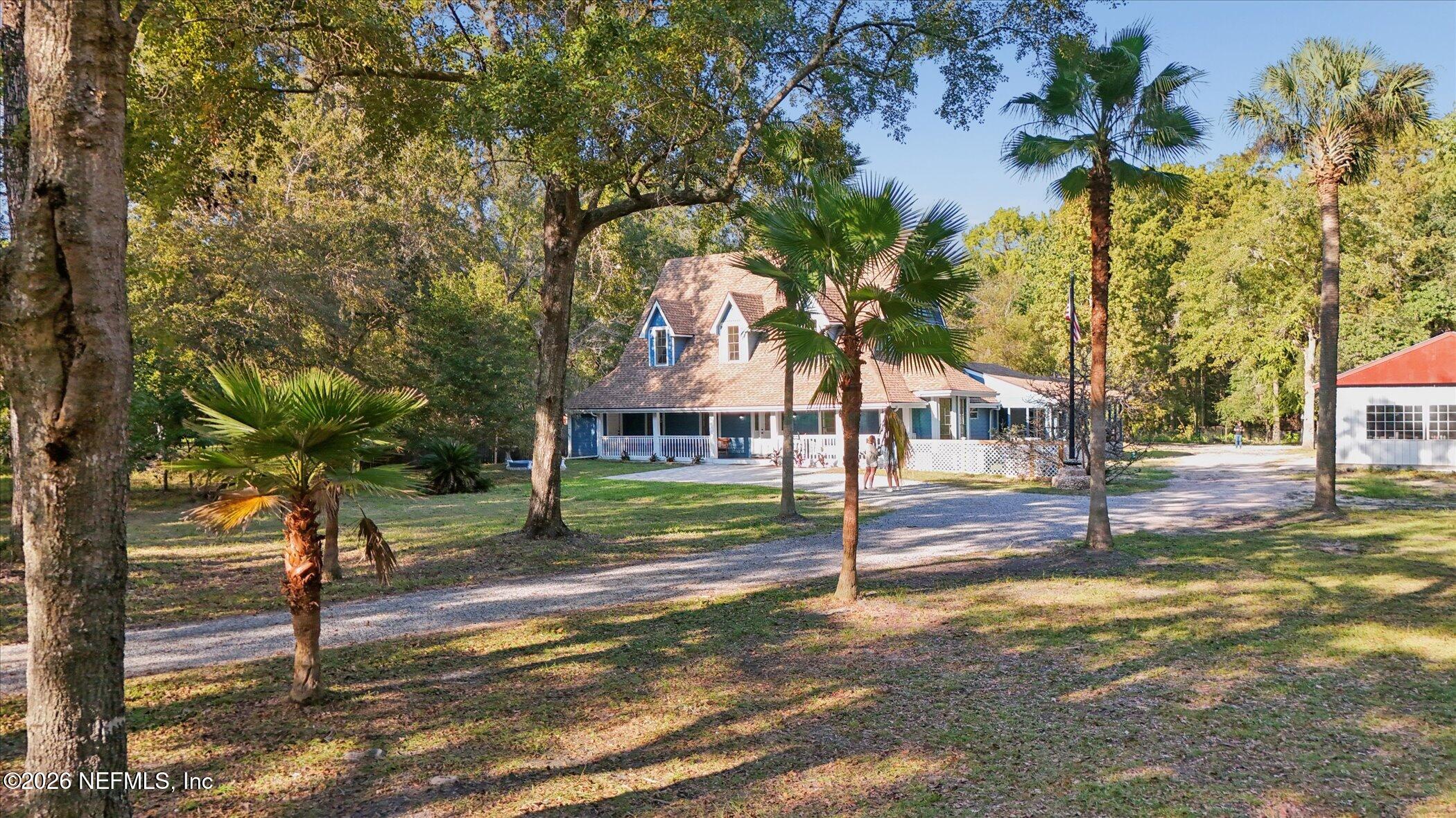 3121 Lannie Road Jacksonville, FL 32218 - Photo 7 of 68 a view of a house with a yard