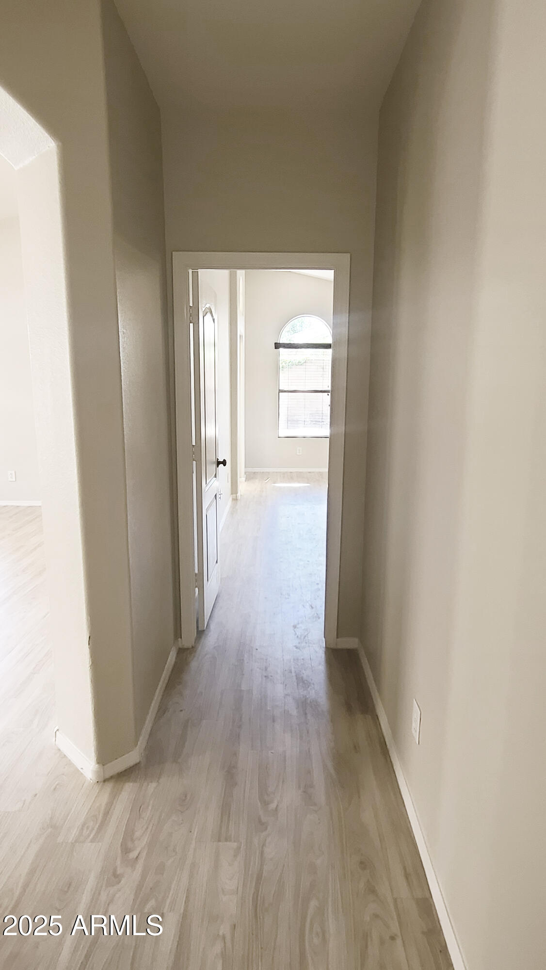 1729 East Pony Lane Gilbert, AZ 85295 - Photo 12 of 31 a view of a hallway with wooden floor