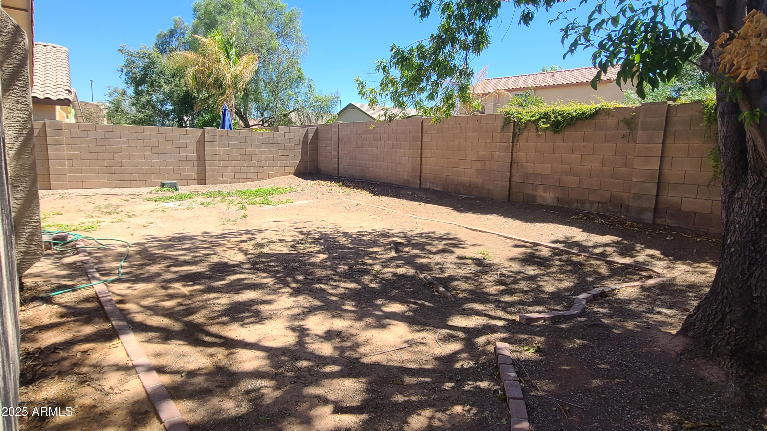 1729 East Pony Lane Gilbert, AZ 85295 - Photo 30 of 31 a backyard of a house