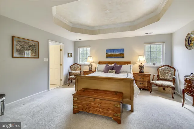 a bed room with furniture and a window