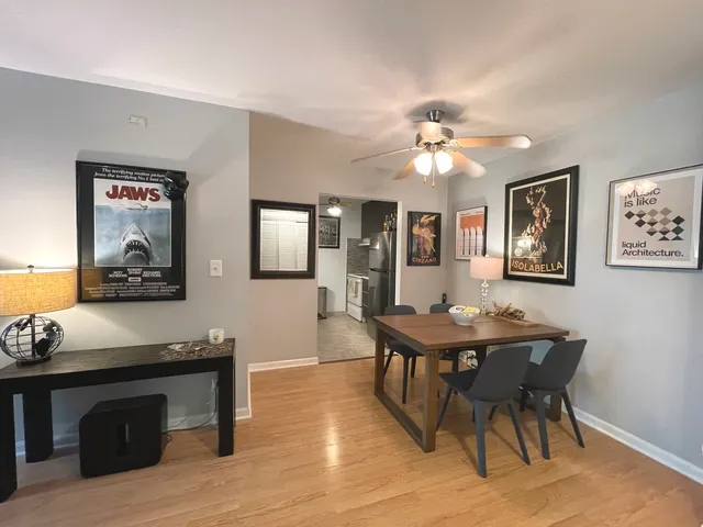 a bedroom with a bed and a lamp