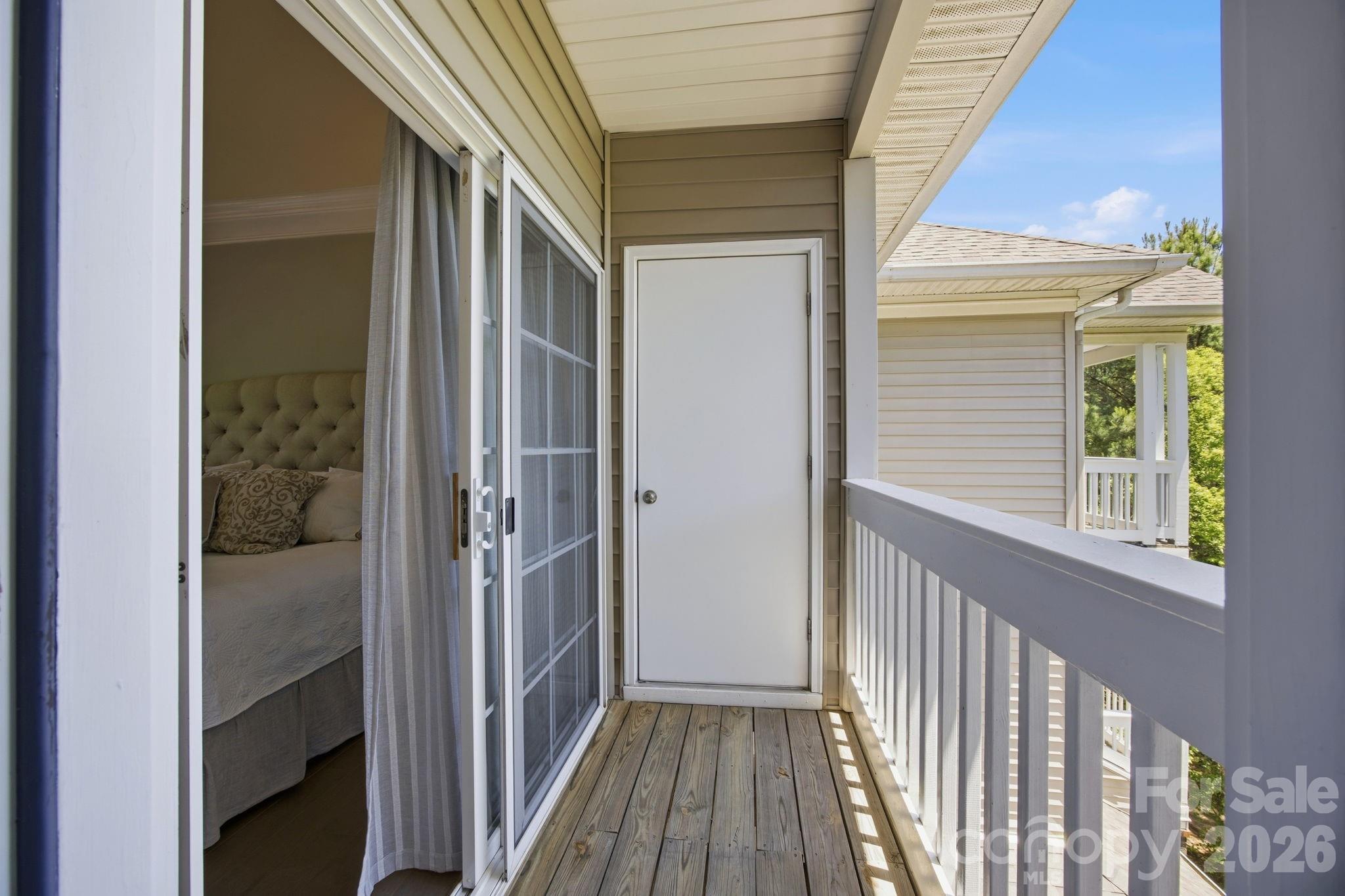 8942 Rosalyn Glen Road Cornelius, NC 28031 - Photo 43 of 47 a view of wooden balcony
