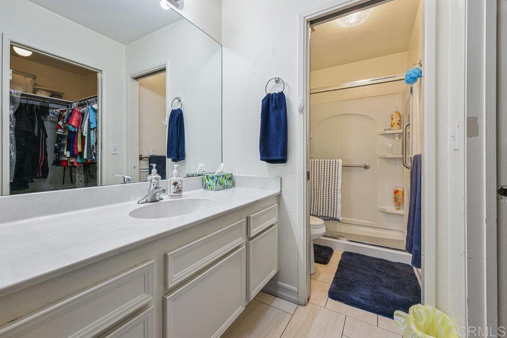 10385 Seth Way Santee, CA 92071 - Photo 19 of 33 a bathroom with a sink and a mirror