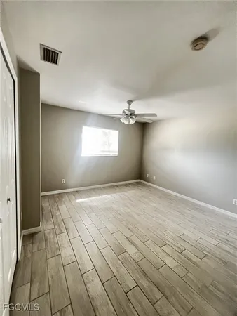 an empty room with windows