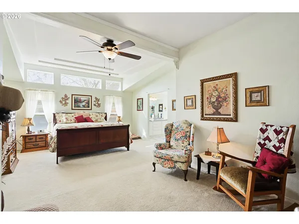 a living room with furniture and a piano
