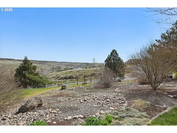a view of a city from a yard