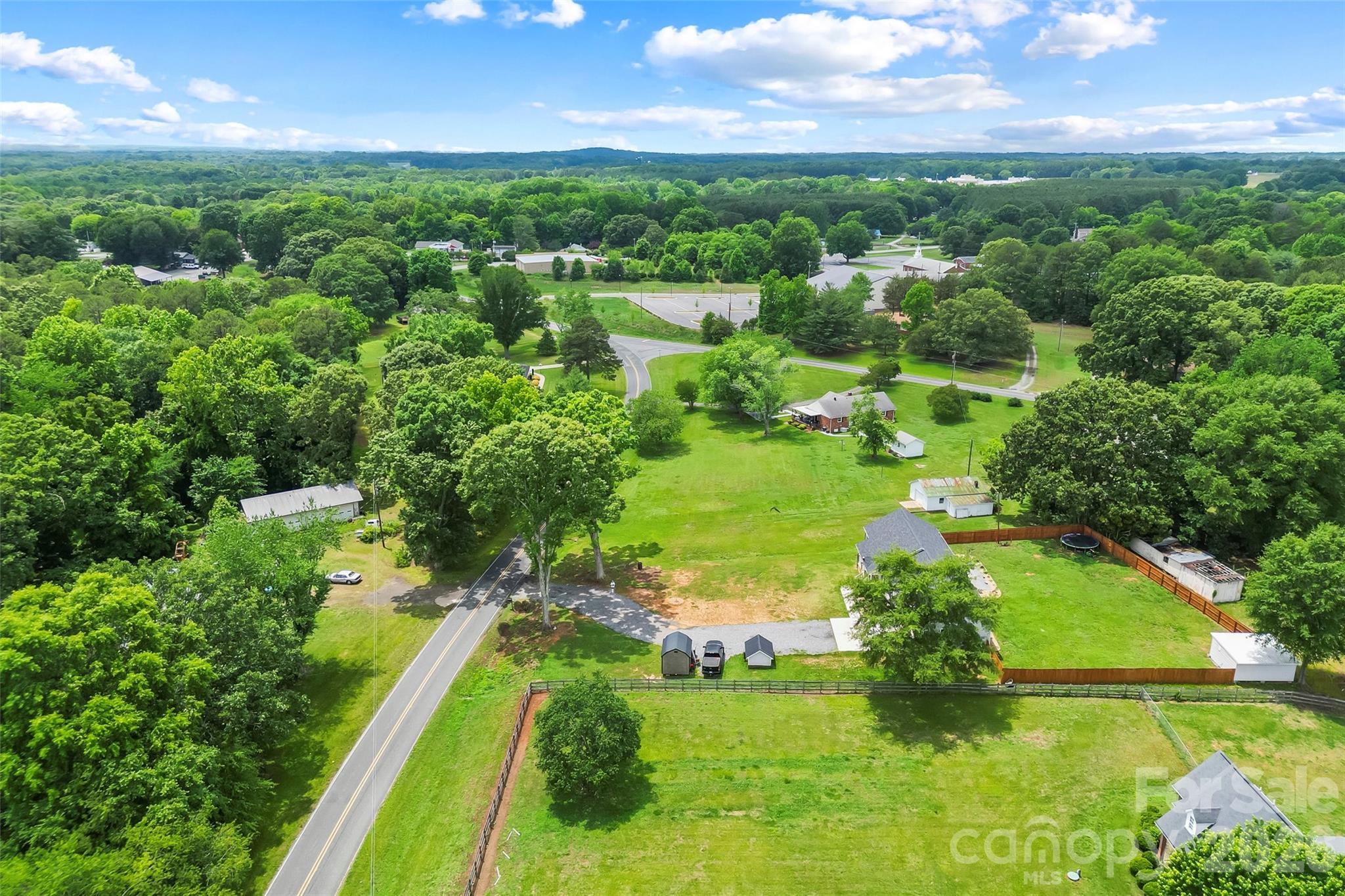 3511 Randleman Road Iron Station, NC 28080 - Photo 30 of 31 a view of a lake with a yard