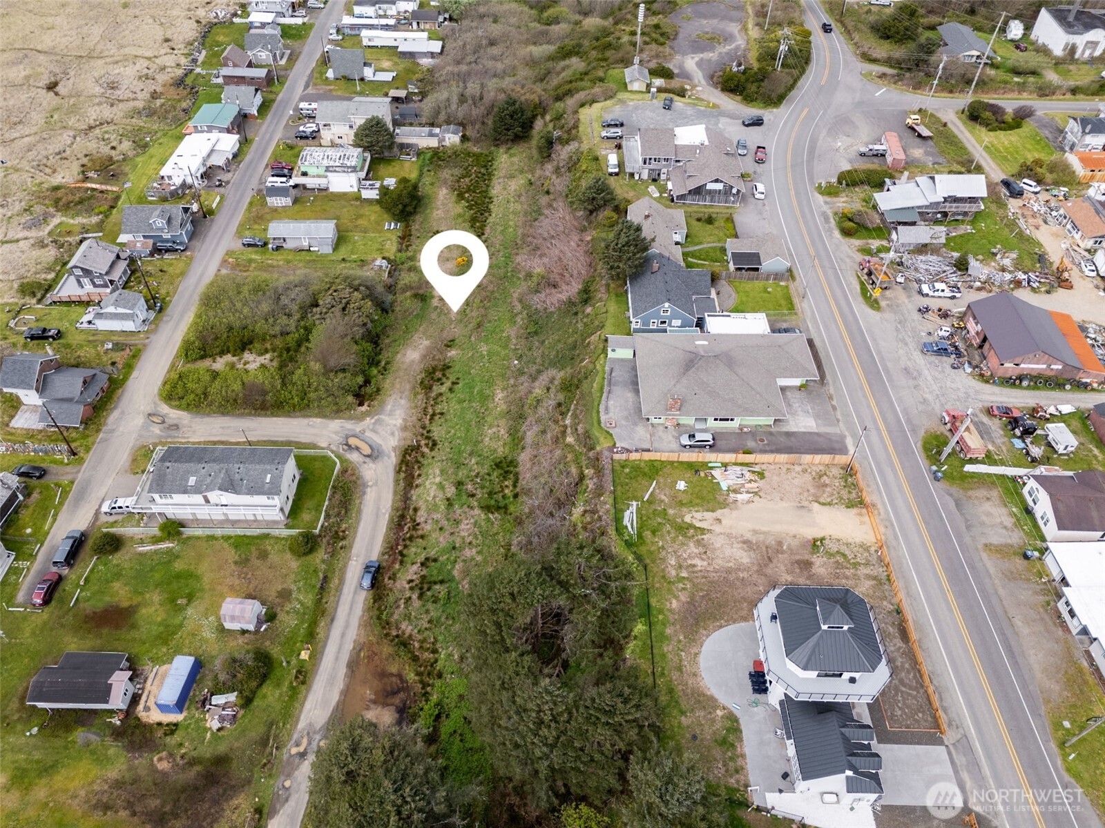 4784 Beach Lane Moclips, WA 98562 - Photo 6 of 10 an aerial view of a house with a yard