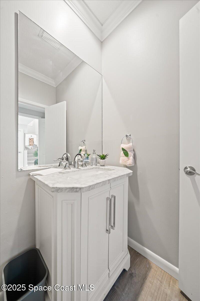 505 Sanderling Drive Indialantic, FL 32903 - Photo 31 of 63 a bathroom with a sink and a mirror