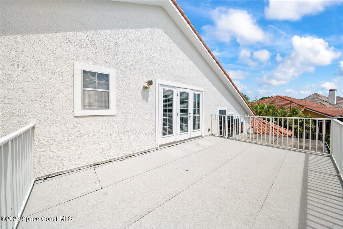505 Sanderling Drive Indialantic, FL 32903 - Photo 40 of 63 a porch with seating space