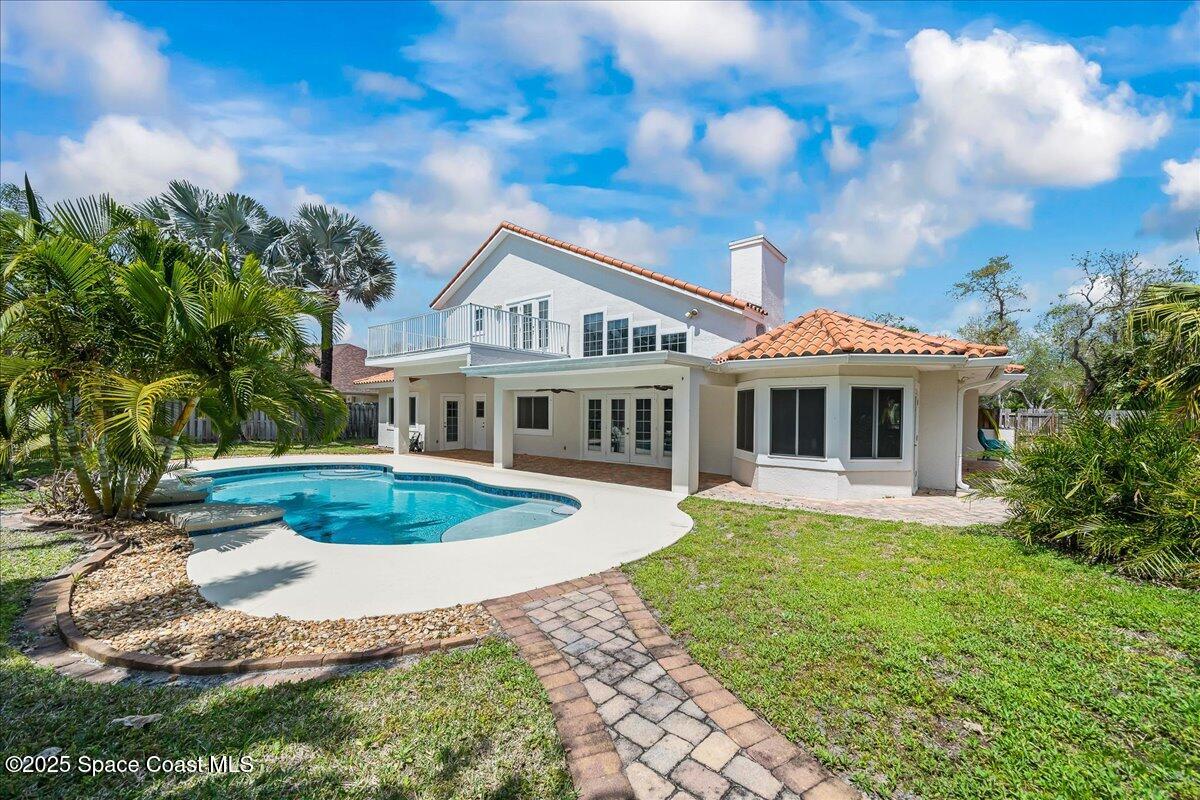505 Sanderling Drive Indialantic, FL 32903 - Photo 47 of 63 a front view of a house with a yard