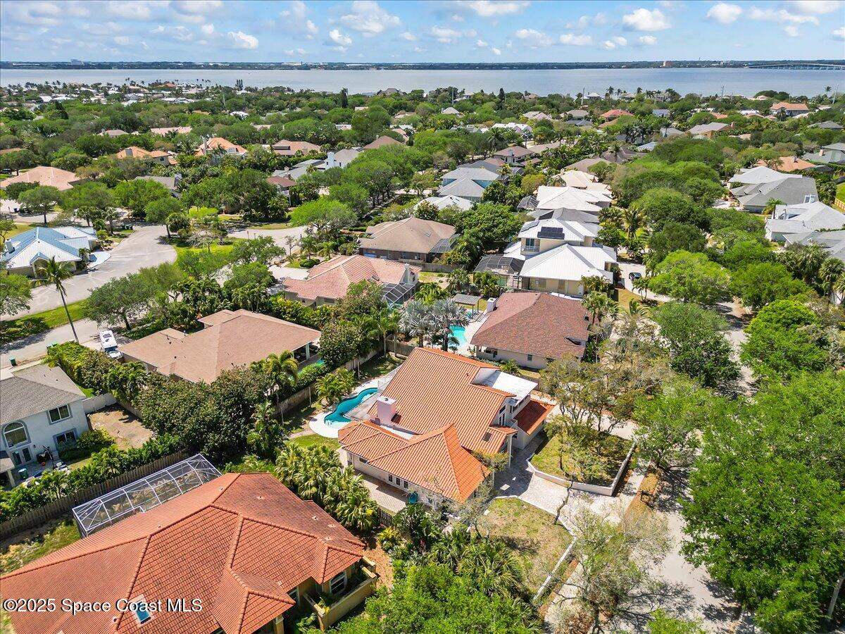 505 Sanderling Drive Indialantic, FL 32903 - Photo 55 of 63 an aerial view of residential houses with outdoor space