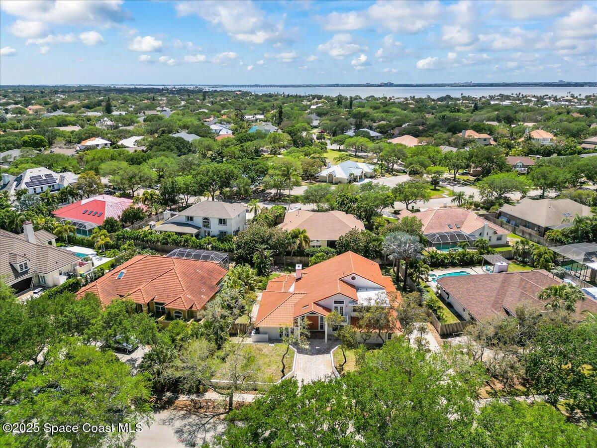 505 Sanderling Drive Indialantic, FL 32903 - Photo 57 of 63 an aerial view of residential houses with outdoor space and ocean view