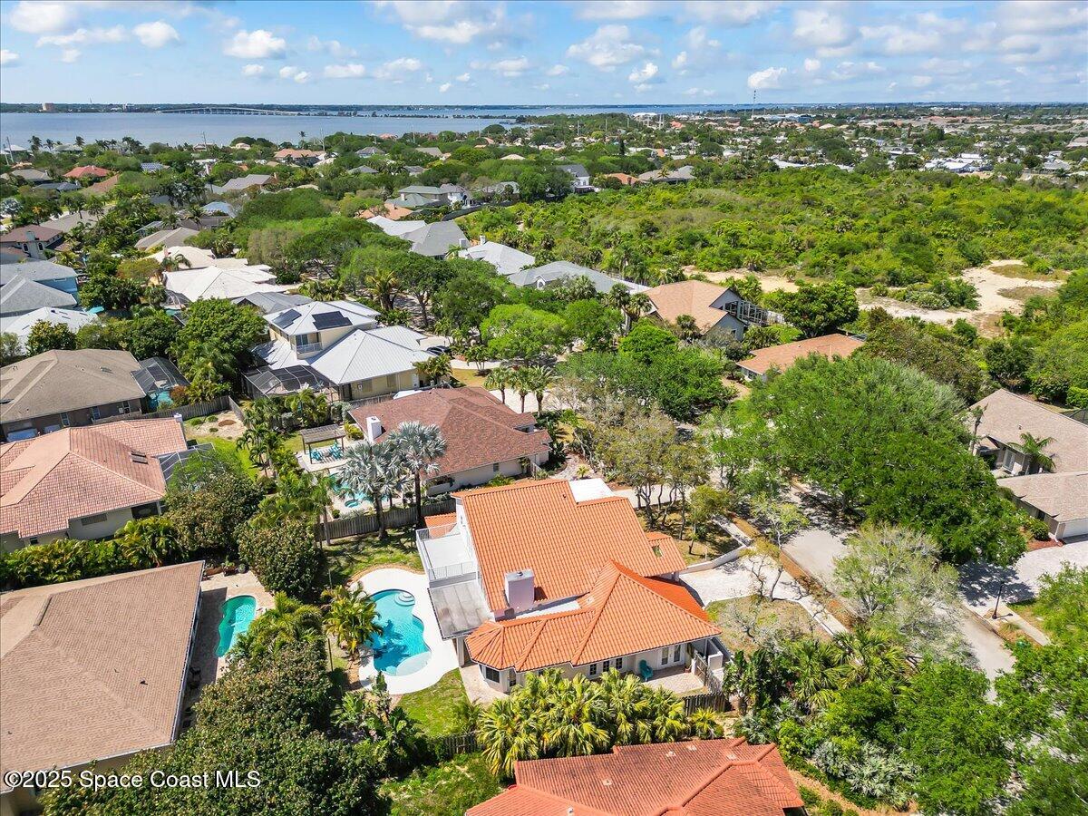 505 Sanderling Drive Indialantic, FL 32903 - Photo 59 of 63 an aerial view of a house with a garden