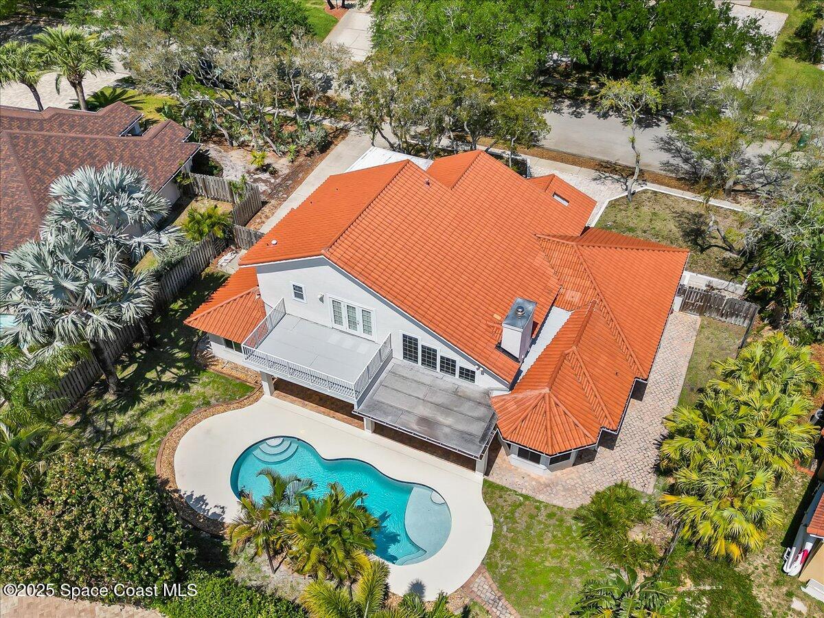 505 Sanderling Drive Indialantic, FL 32903 - Photo 60 of 63 an aerial view of a house with outdoor space and tennis court