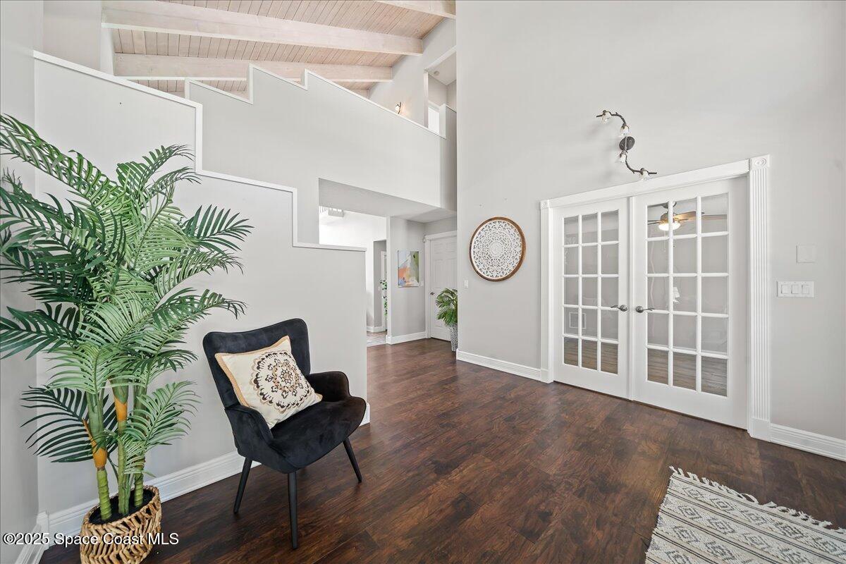 505 Sanderling Drive Indialantic, FL 32903 - Photo 6 of 63 a view of a livingroom with furniture and a potted plant