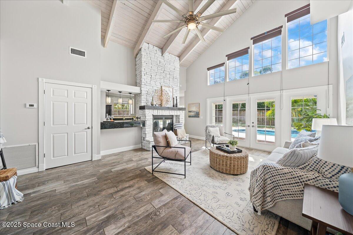 505 Sanderling Drive Indialantic, FL 32903 - Photo 7 of 63 a living room with furniture and a large window