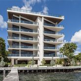 a front view of a building with balcony