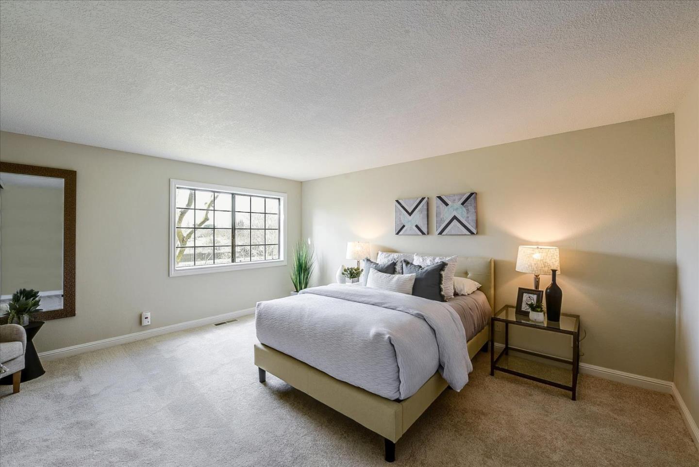 3120 Heather Ridge Drive San Jose, CA 95136 - Photo 17 of 25 a bedroom with a bed and a window