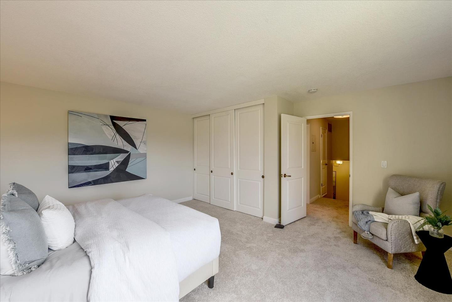 3120 Heather Ridge Drive San Jose, CA 95136 - Photo 19 of 25 a bedroom with a bed and a couch