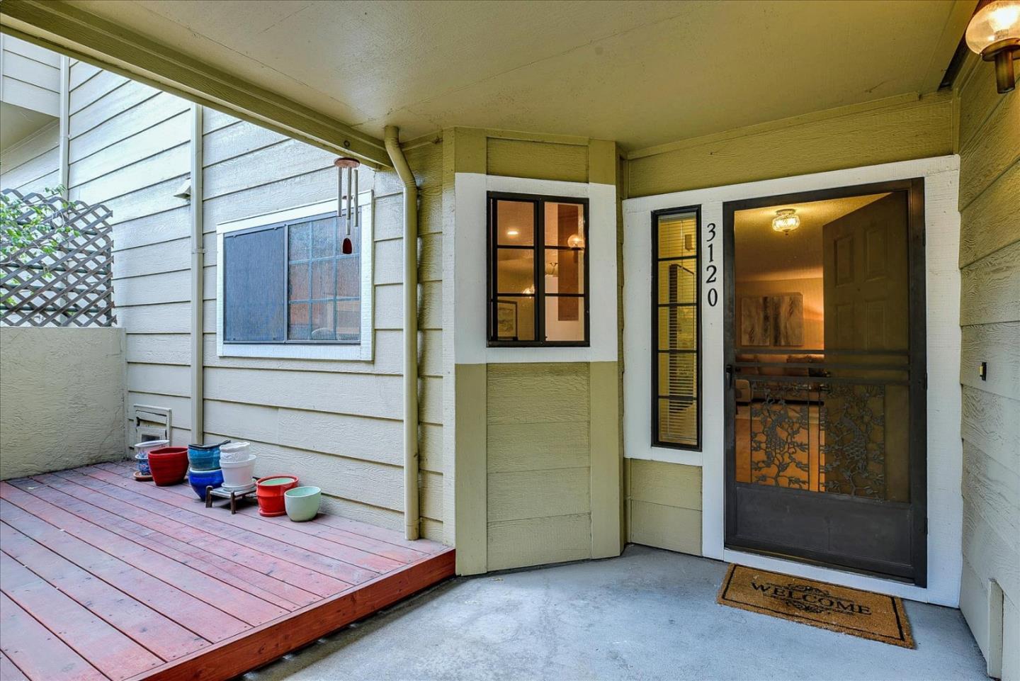 3120 Heather Ridge Drive San Jose, CA 95136 - Photo 2 of 25 a view of a yoga room with wooden floor and windows