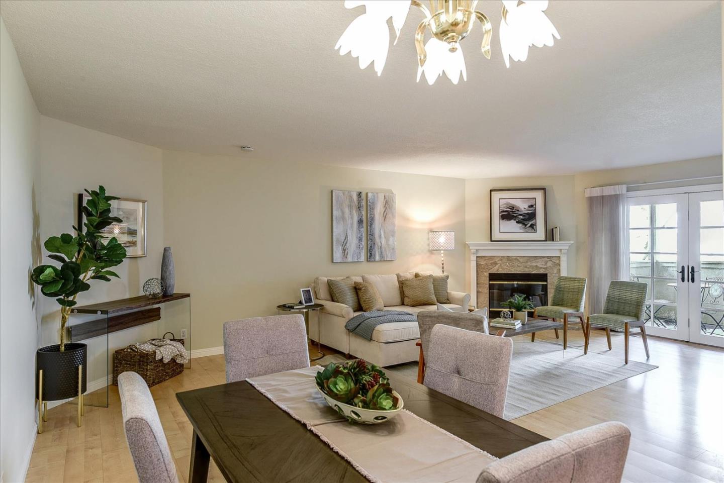 3120 Heather Ridge Drive San Jose, CA 95136 - Photo 8 of 25 a living room with furniture a fireplace and a potted plant