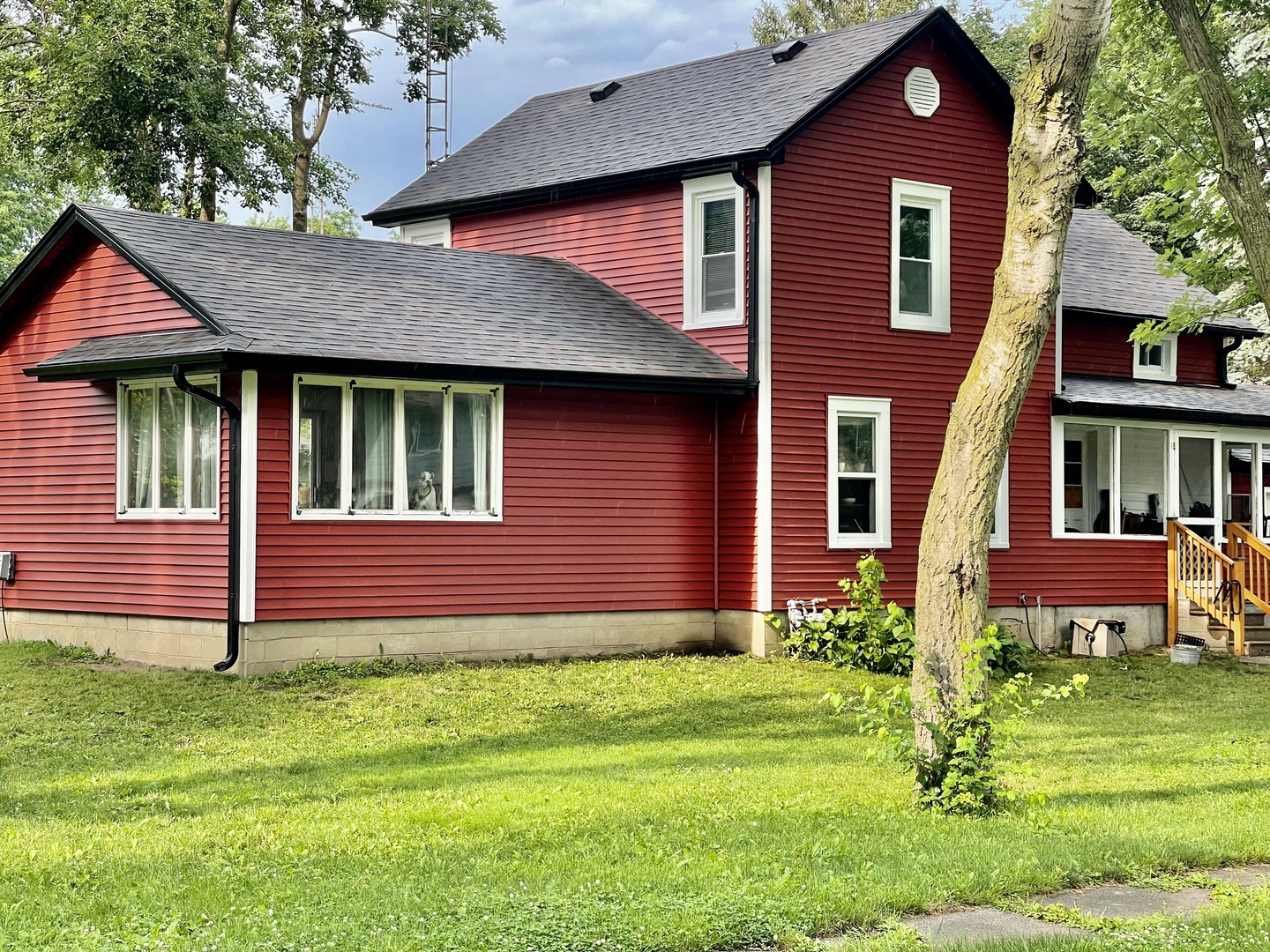 211 State Street Maple Park, IL 60151 - Photo 1 of 19 a front view of a house with a garden
