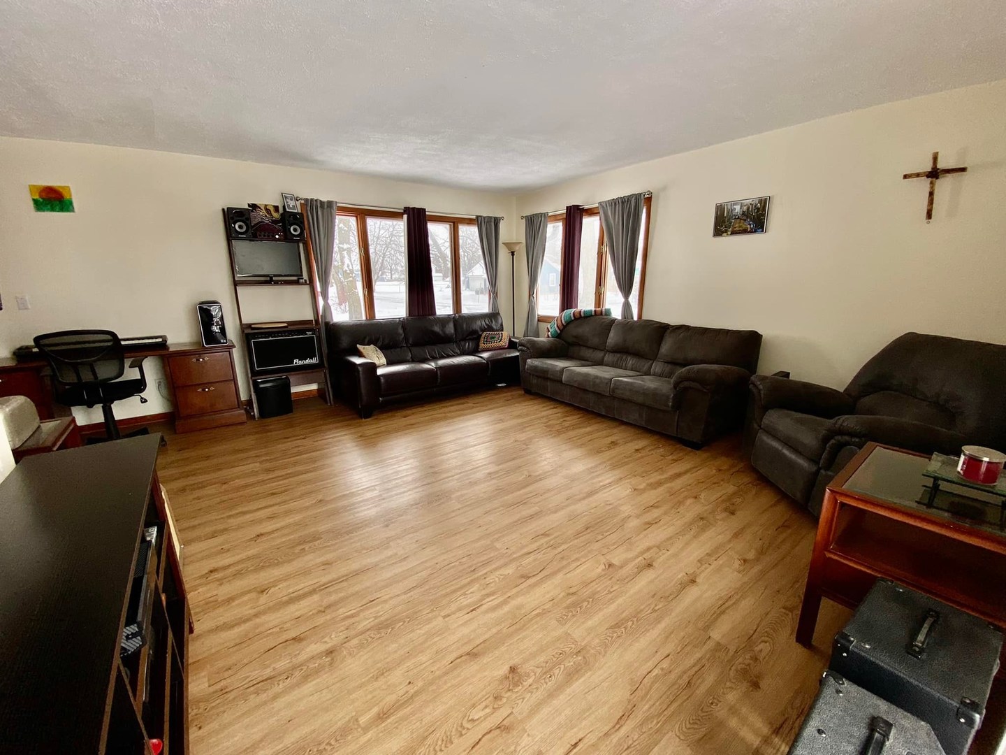 211 State Street Maple Park, IL 60151 - Photo 9 of 19 a living room with furniture and a wooden floor