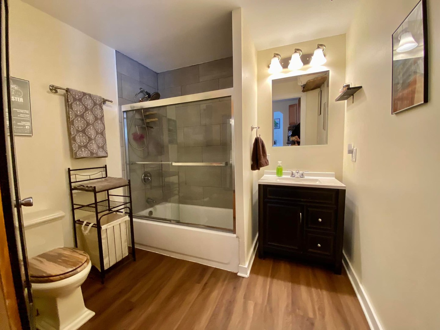 211 State Street Maple Park, IL 60151 - Photo 10 of 19 a bathroom with a sink and a mirror