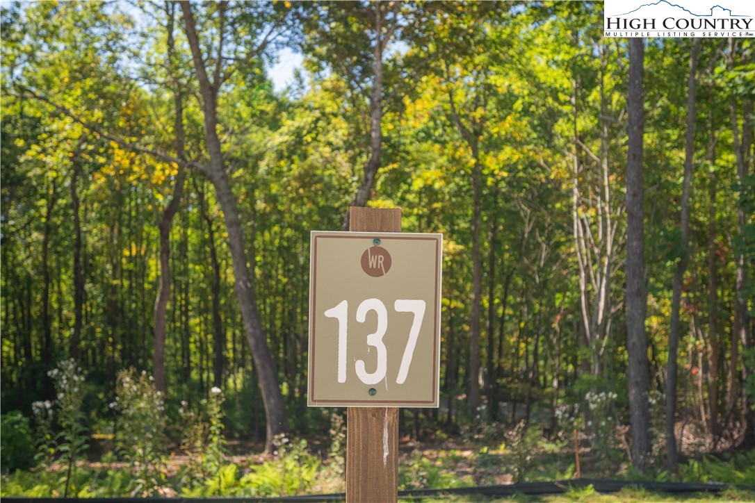 Lot 137 Angelfire Trail Deep Gap, NC 28618 - Photo 12 of 27 a sign that is on a pole