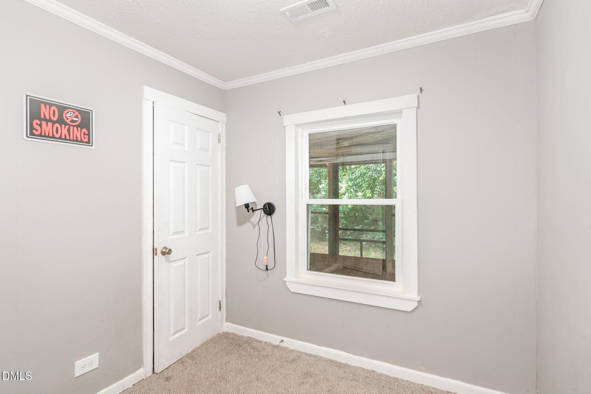 1401 Robinhood Road Durham, NC 27701 - Photo 27 of 38 a view of an empty room with a window