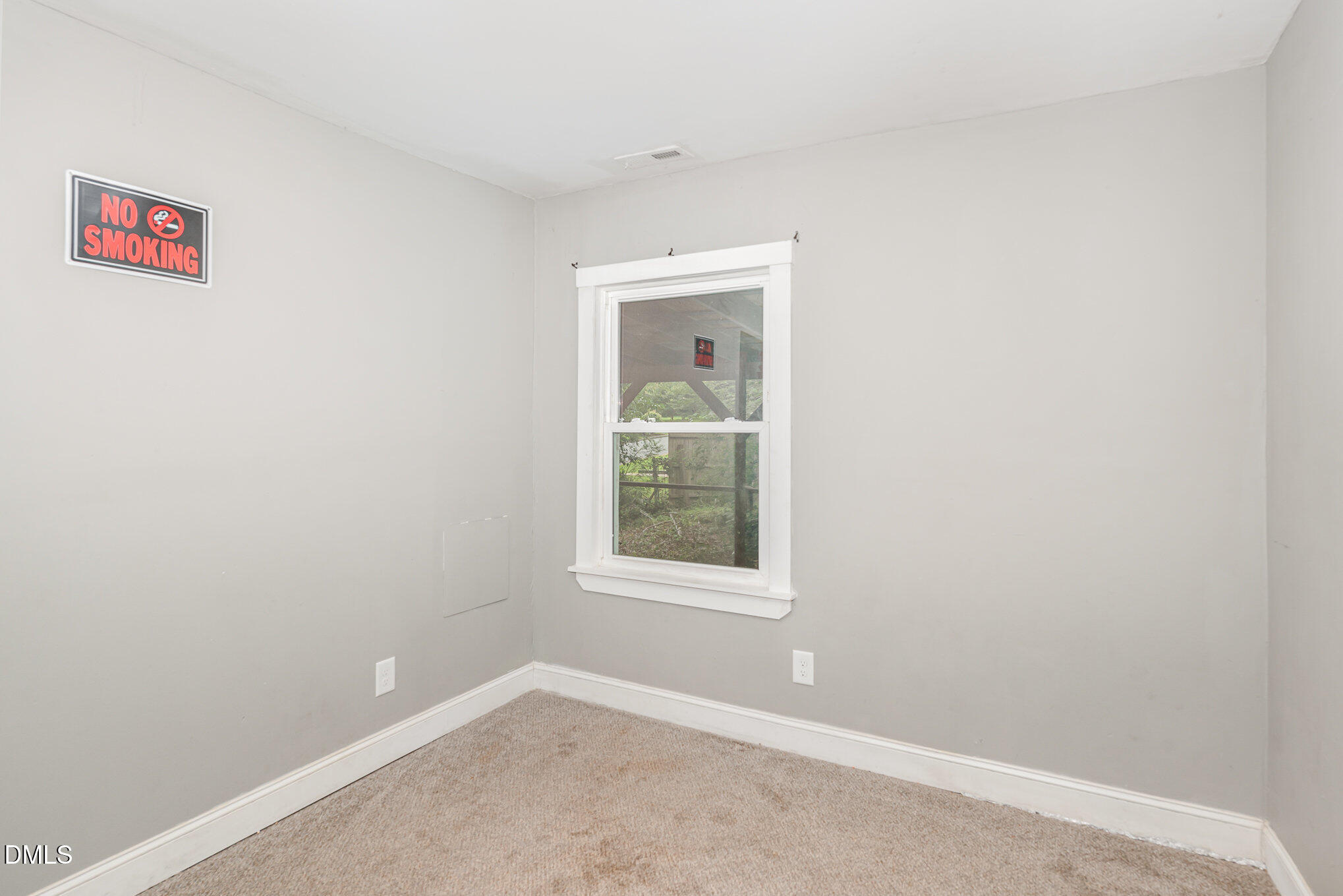 1401 Robinhood Road Durham, NC 27701 - Photo 30 of 38 an empty room with a window