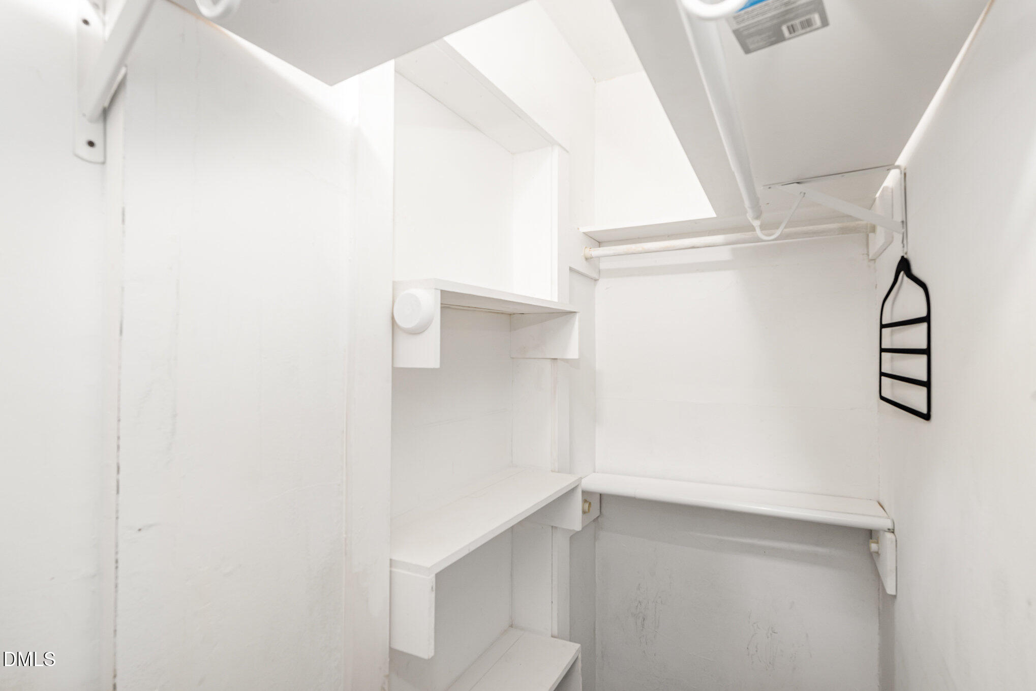 1401 Robinhood Road Durham, NC 27701 - Photo 33 of 38 a view of an empty walk in closet