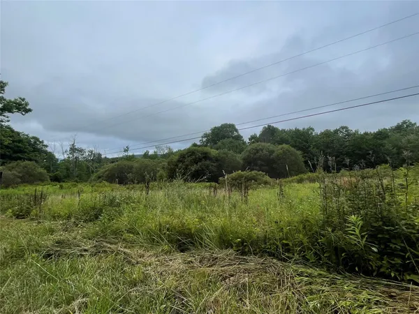 a view of a lake with a outdoor space