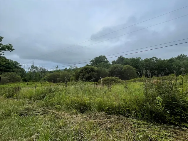 a view of a lake with a outdoor space