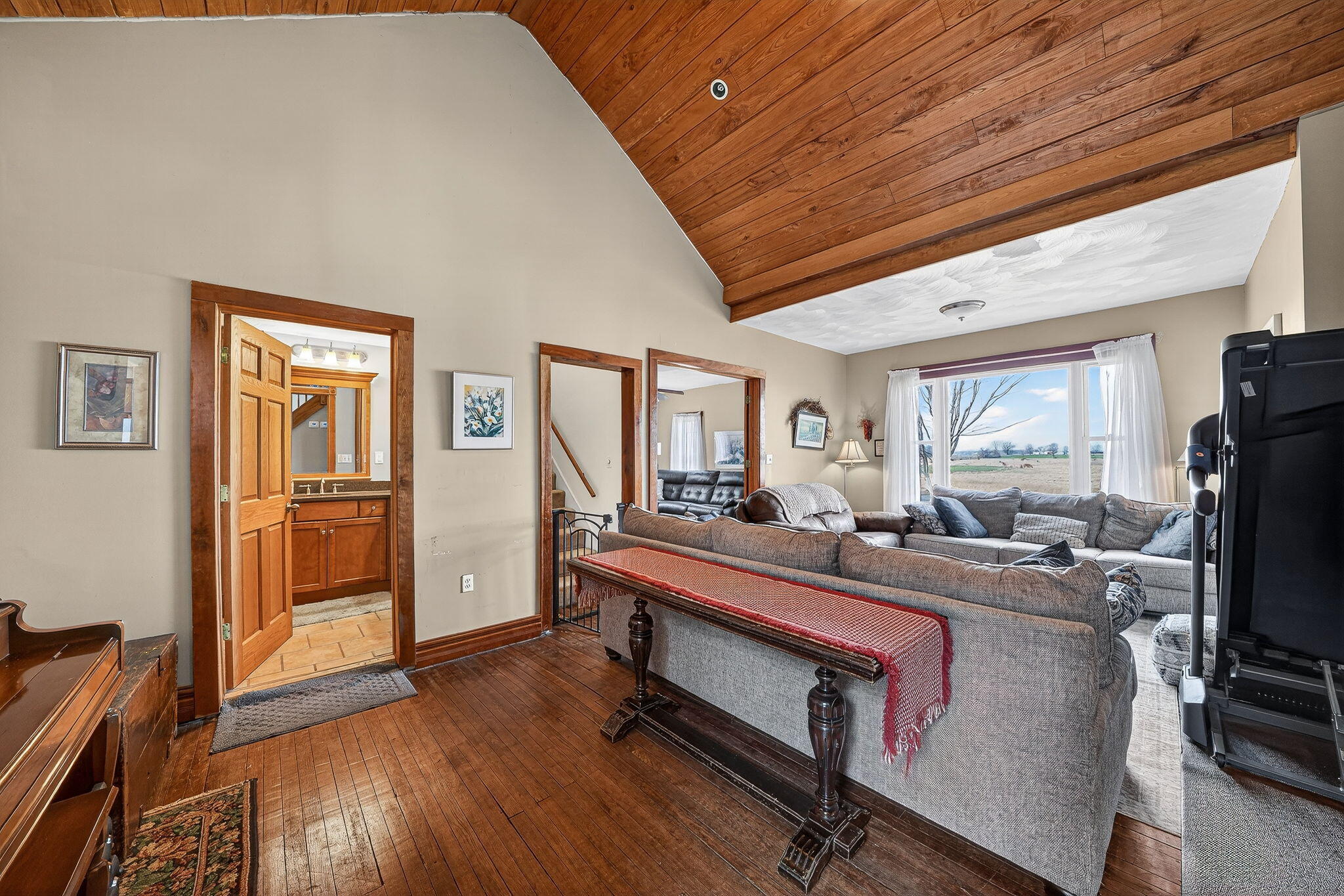 11403 Highway 10 Argos, IN 46501 - Photo 11 of 50 a room with furniture and a flat screen tv